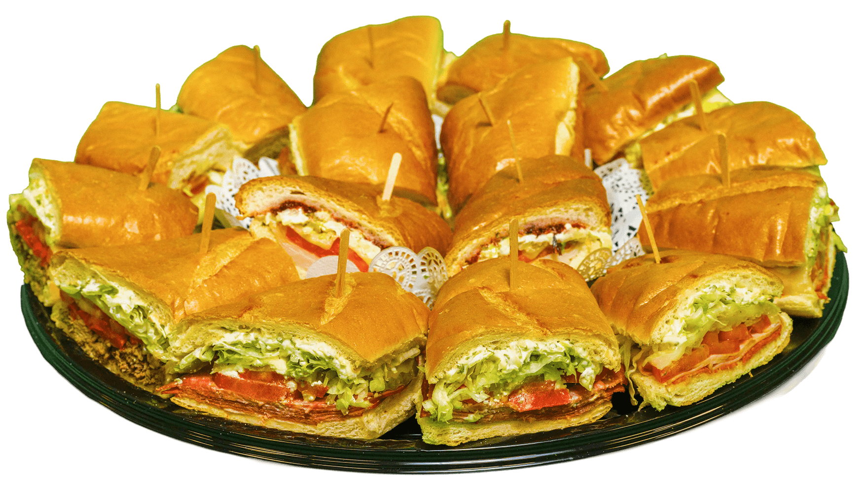 A catering buffet table displaying several chafing dishes with various foods, including rolled crepes or pancakes, a vibrant green dish, and other warm entrees, adorned with white flowers.